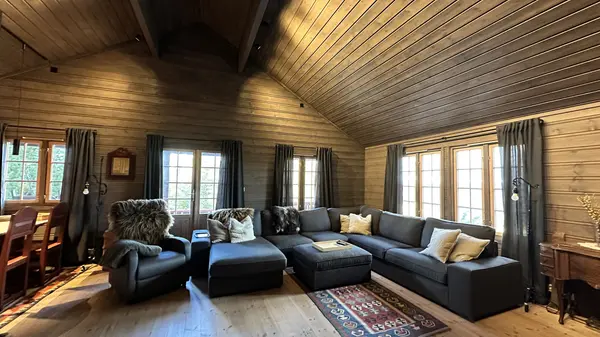 Living room with big windows toward the valley